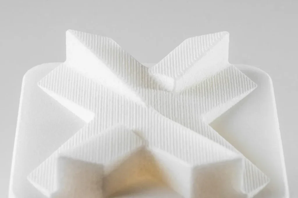 SLS Nylon 12 FR Closeup 2 1440x960 1 پرینت سهبعدی؛ از ایده تا تولید SLS material for 3d print